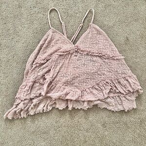 Urban Outfitters pink babydoll tank top in a women’s large.